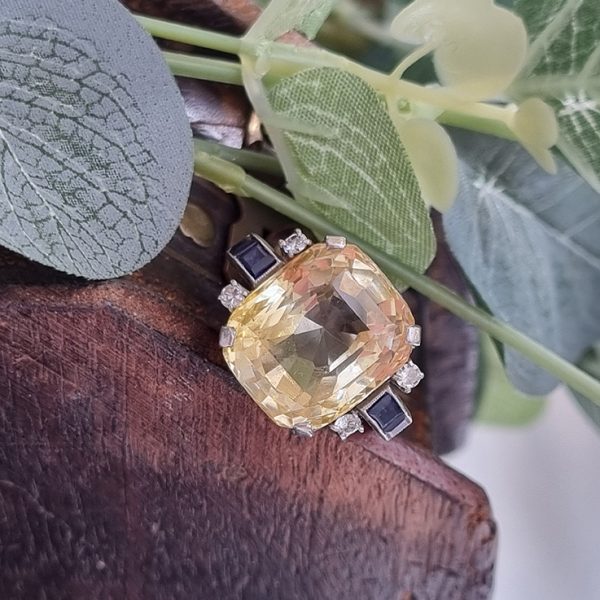 Vintage 1940s Retro 16cts Cushion Cut Yellow Sapphire Ring with Blue Sapphire and Diamond Shoulders in Platinum