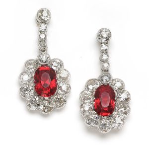 Red spinel and diamond cluster drop earrings in platinum.