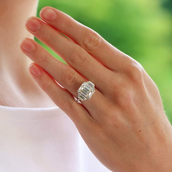 GIA certified 4.93 carat emerald cut diamond ring set in platinum.
