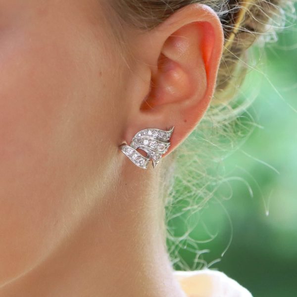 Diamond scroll earrings set in platinum