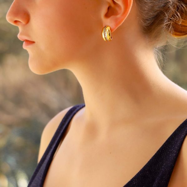 Vintage Boodles diamond leaf earrings in gold.