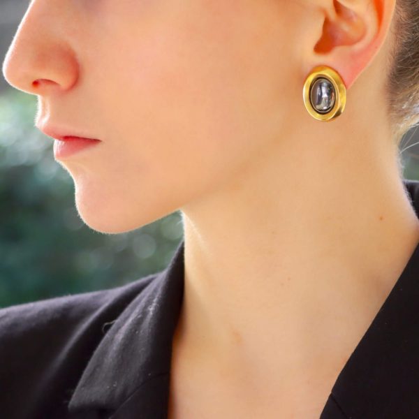 Vintage Angela Cummings hematite earrings set in yellow gold.