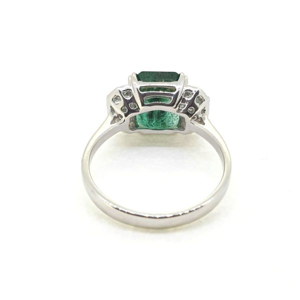Contemporary 2.85ct Emerald and Diamond Three Stone Engagement Ring