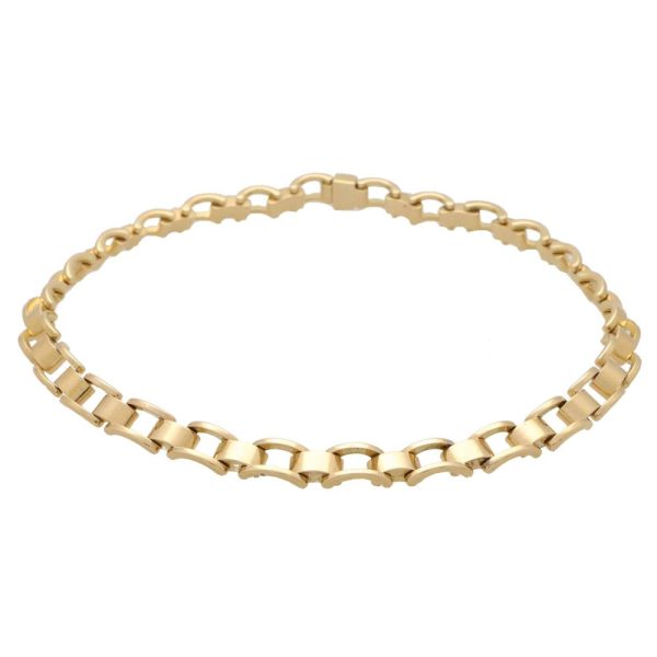 Vintage Mauboussin link necklace set in yellow gold.