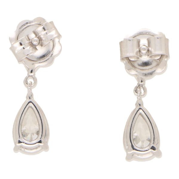 Diamond drop earrings set in platinum.