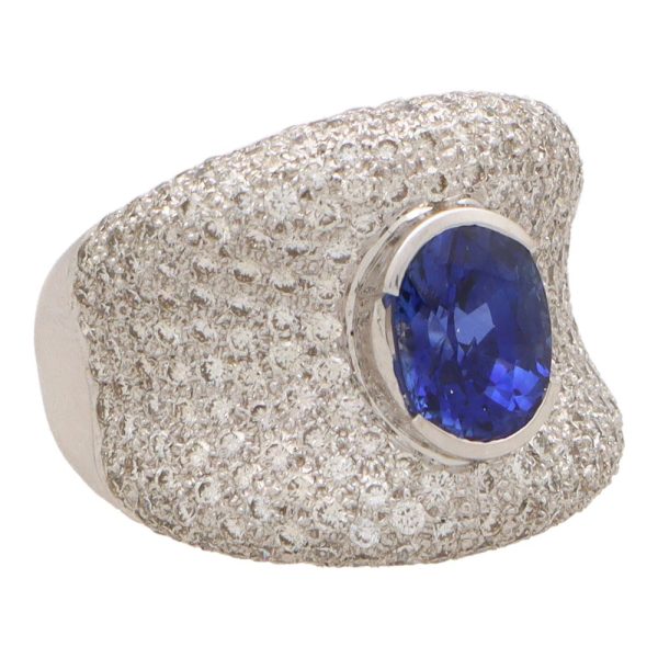 Vintage sapphire and diamond bombe ring in white gold.