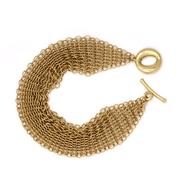 Tiffany & Co. gold multi-strand mesh bracelet.