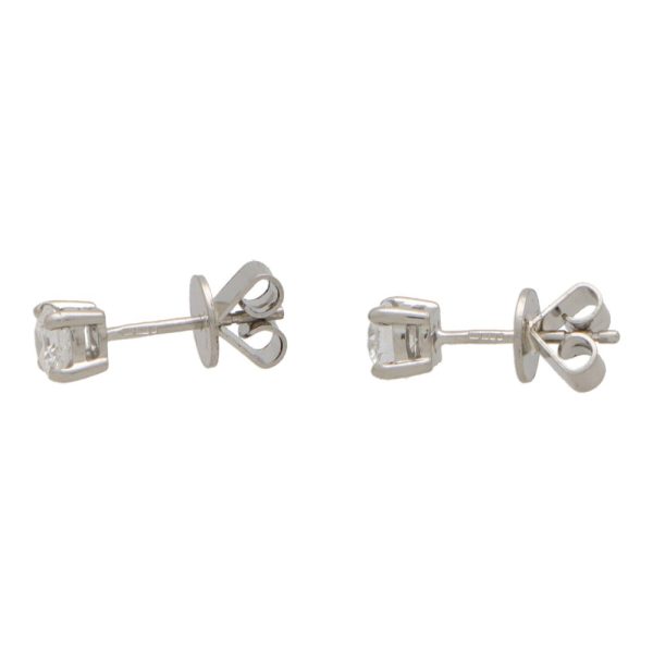 GIA certified diamond stud earrings in platinum.