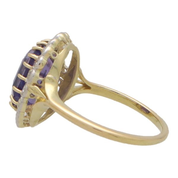 Vintage colour change sapphire and diamond cluster ring in yellow and white gold.
