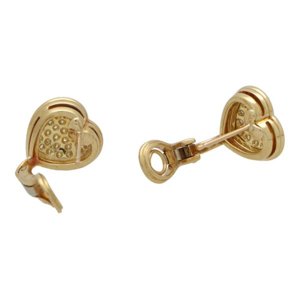 Picchiotti diamond heart earrings in yellow gold.