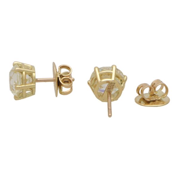 Old European cut diamond stud earrings set in gold.