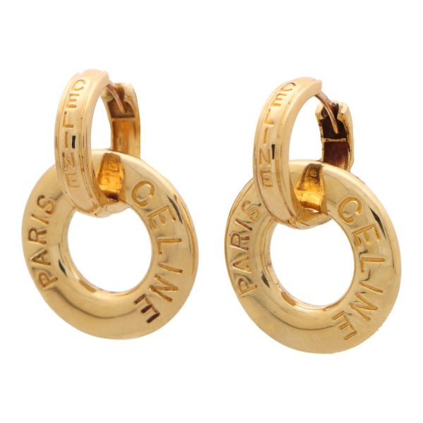 Celine logo detachable hoop earrings in yellow gold.