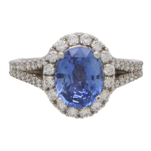 Vintage sapphire and diamond cluster ring in white gold.