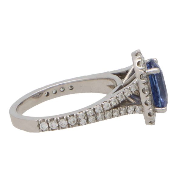 Vintage sapphire and diamond cluster ring in white gold.