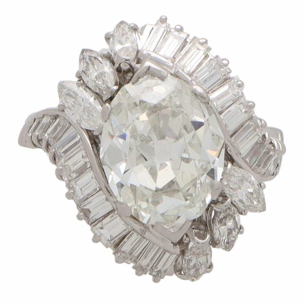 Vintage old marquise cut 4.43 carat diamond cluster ring set in platinum.