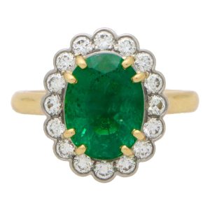 Contemporary 3.12 Carat Emerald and Diamond Cluster Ring In Gold And Platinum