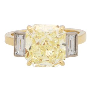 GIA Certified Natural 5.03 Carat Yellow Diamond Three Stone Ring In Gold And Platinum