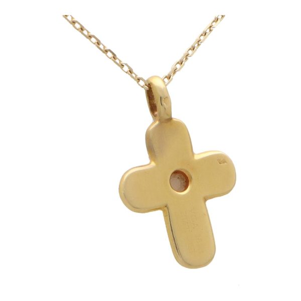 Van Cleef and Arpels mother of pearl cross pendant necklace set in yellow gold.