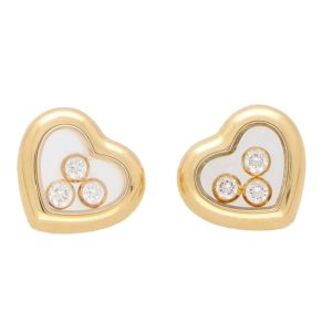 Chopard diamond heart stud earrings set in yellow gold.