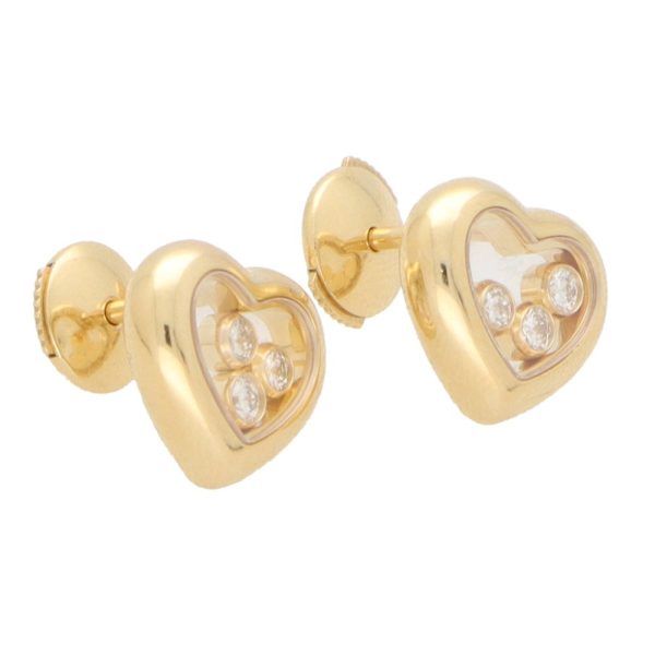 Chopard diamond heart stud earrings set in yellow gold.