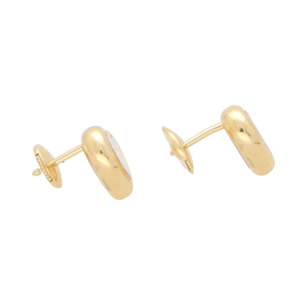 Chopard diamond heart stud earrings set in yellow gold.