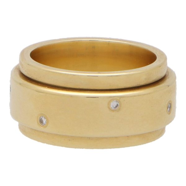 Piaget diamond band ring set in yellow gold.