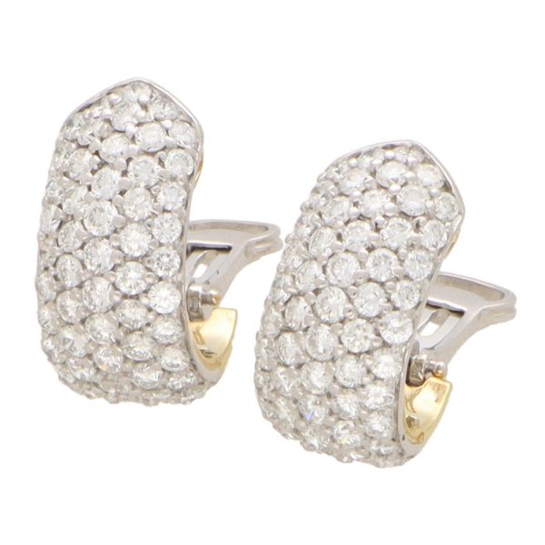Vintage diamond hoop earrings in yellow gold.