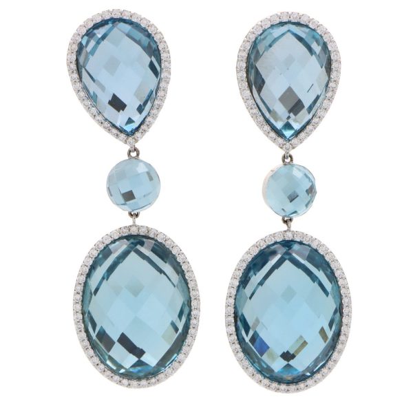 Vintage Roberto Coin blue topaz and diamond drop earrings in white gold.