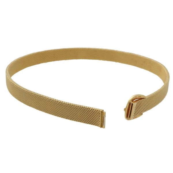 Vintage Hermès belt buckle wrap bracelet set in 18 carat yellow gold.