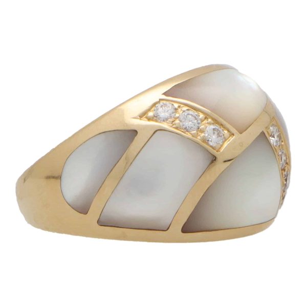 Vintage mother of pearl and diamond bombé ring in yellow gold.