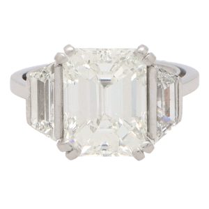 GIA certified 4.93 carat emerald cut diamond ring set in platinum.