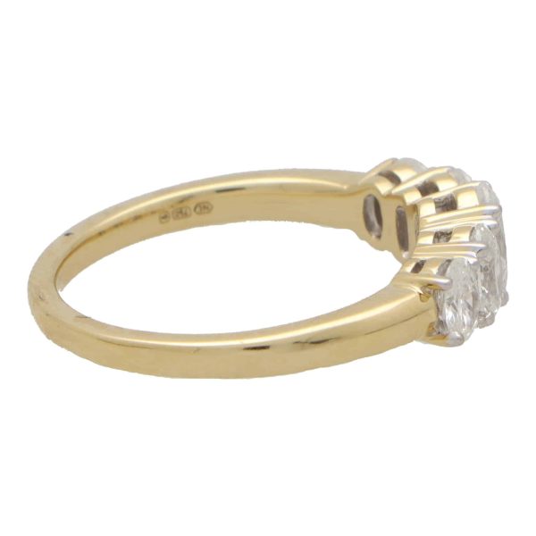 Diamond five stone ring set in yellow and white gold.
