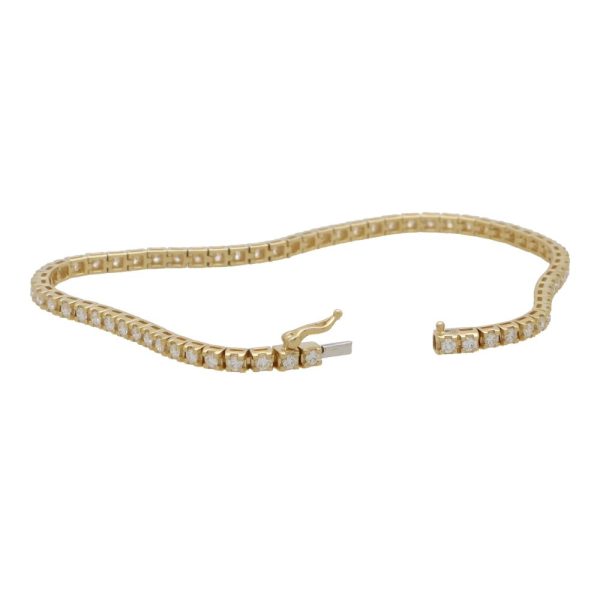 2.00 carat diamond line bracelet in yellow gold.