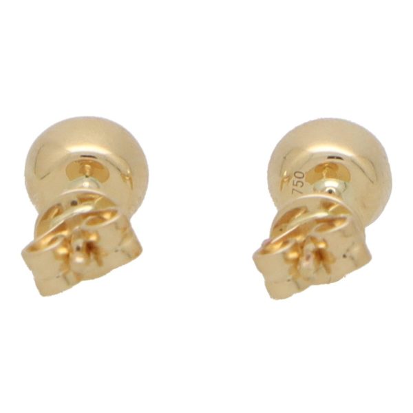 Sapphire stud earrings set in yellow gold