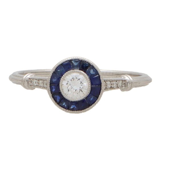 Diamond and sapphire target ring in white gold.