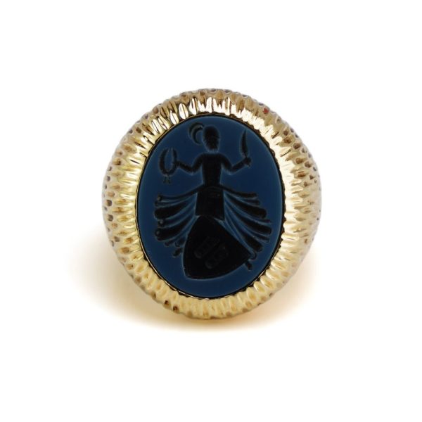 Gold signet ring with an oval carved sardonyx intaglio.