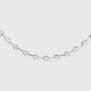Diamond spacer line necklace in white gold.