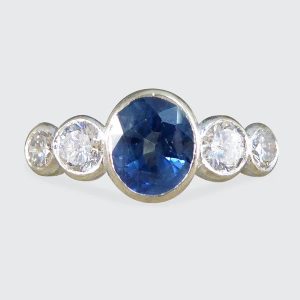 Edwardian sapphire and diamond five stone ring in white and yellow gold.