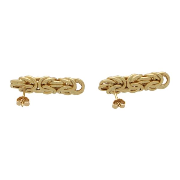 Vintage knotted long drop gold earrings.