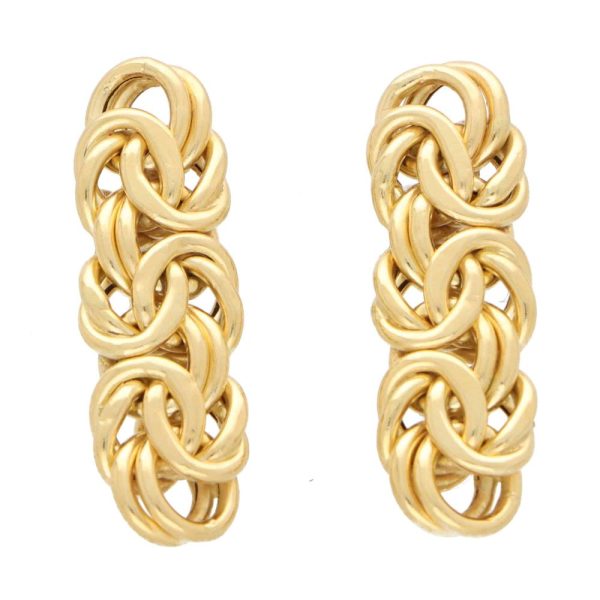 Vintage knotted long drop gold earrings.