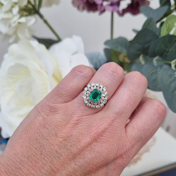 Vintage Muzo Italian 1.4ct Emerald and 2.5ct Diamond Double Cluster Ring, cushion-shaped emerald surrounded by marquise-cut and brilliant-cut diamonds 18ct white gold. Circa 1970s