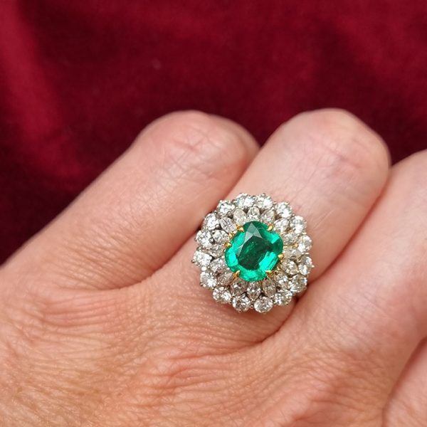 Vintage Muzo Italian 1.4ct Emerald and 2.5ct Diamond Double Cluster Ring, cushion-shaped emerald surrounded by marquise-cut and brilliant-cut diamonds 18ct white gold. Circa 1970s