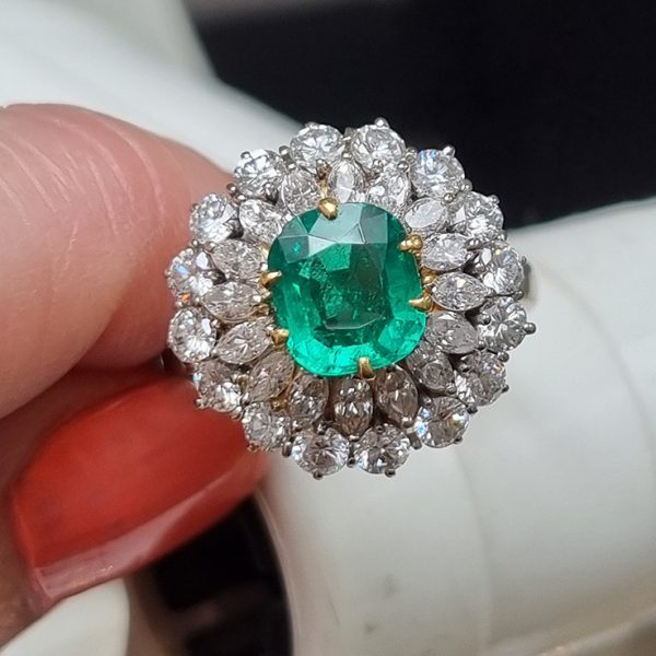 Vintage Muzo Italian 1.4ct Emerald and 2.5ct Diamond Double Cluster Ring, cushion-shaped emerald surrounded by marquise-cut and brilliant-cut diamonds 18ct white gold. Circa 1970s