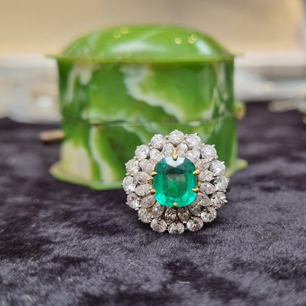 Vintage Muzo Italian 1.4ct Emerald and 2.5ct Diamond Double Cluster Ring, cushion-shaped emerald surrounded by marquise-cut and brilliant-cut diamonds 18ct white gold. Circa 1970s