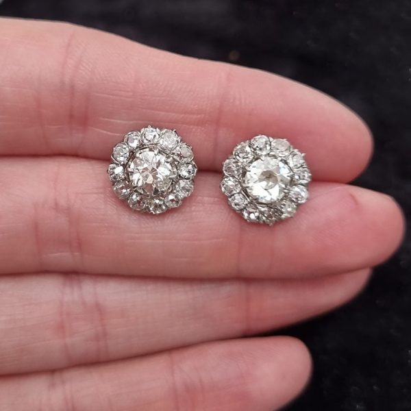 Victorian Antique 2.90ct Old Cut Diamond Cluster Stud Earrings, 0.70ct old-cut diamond centres surrounded by smaller old-cut diamonds, 2.90 carat total