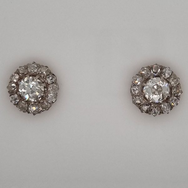 Victorian Antique 2.90ct Old Cut Diamond Cluster Stud Earrings, 0.70ct old-cut diamond centres surrounded by smaller old-cut diamonds, 2.90 carat total