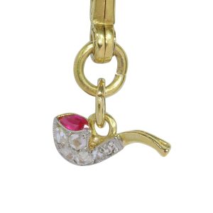 Art Deco Smoking Pipe Pendant With Diamonds And Ruby In Gold And Platinum