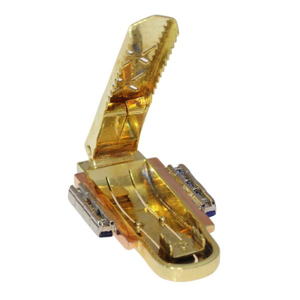 Vintage sapphire clip in tri-colour gold.