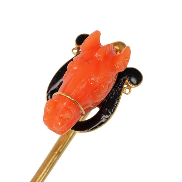Antique horse head tie pin in gold with coral and enamel.