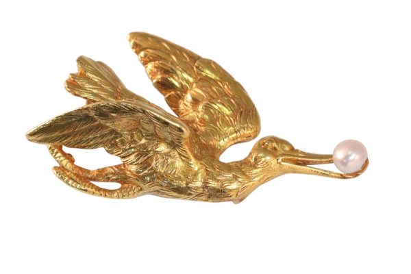 Victorian stork brooch/pendant in gold.